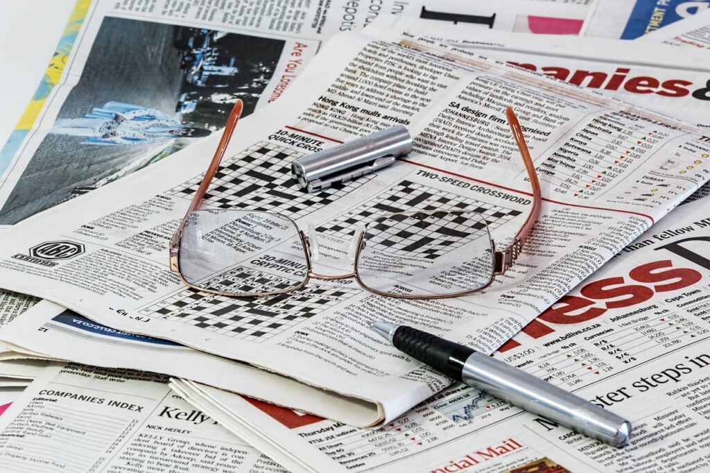 a picture of newspaper crosswords